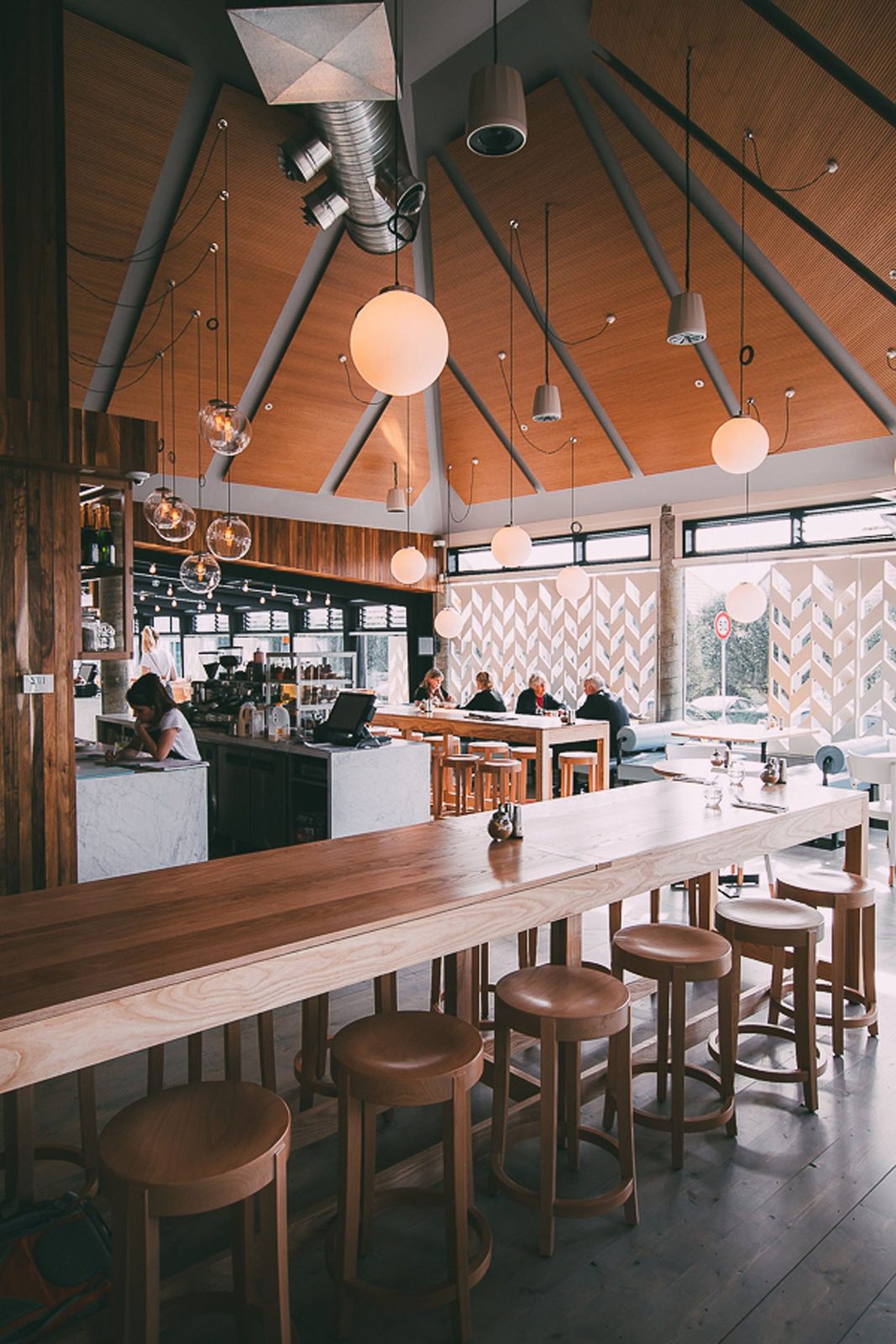 Baker leaners by KMS in a restaurant interior